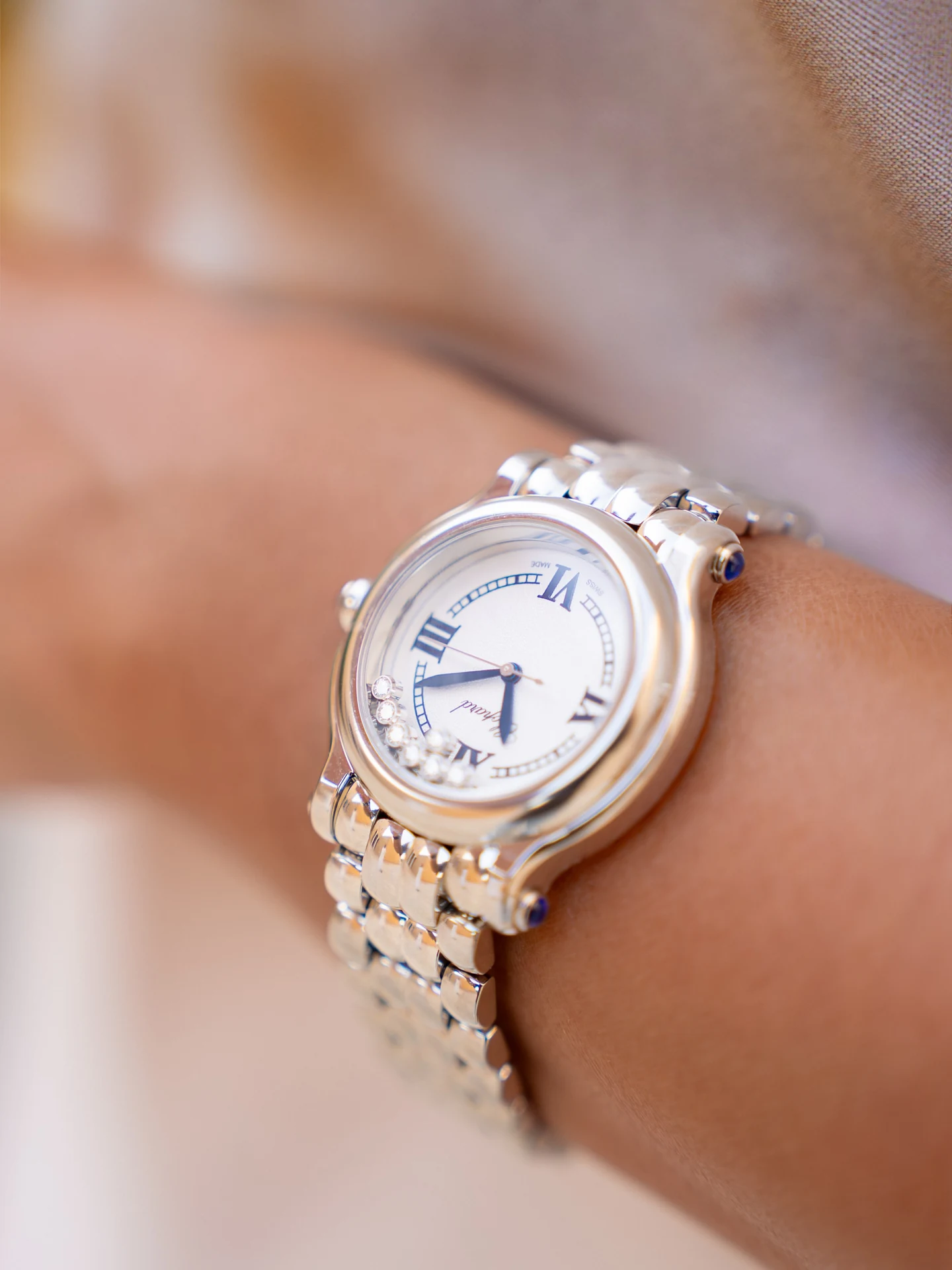 Close-up of the Chopard Happy Sport watch on Rahaf Alharbi’s wrist