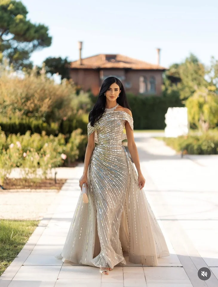 Silver gown outdoors, full length