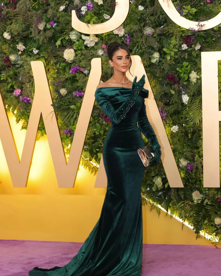 Rahaf wearing a green velvet gown at the Joy Awards