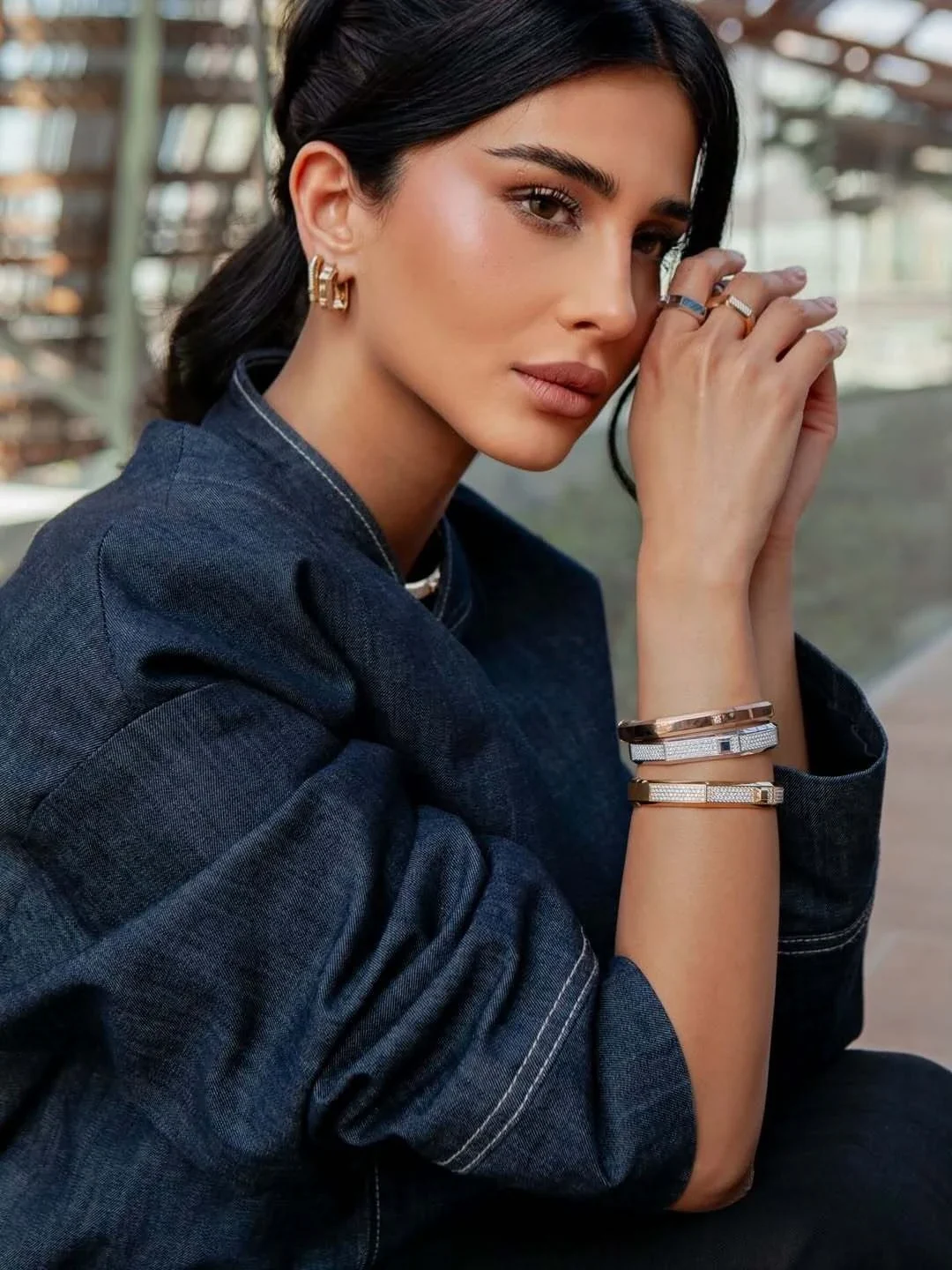 Dark-blue shirt diamond jewelry campaign portrait