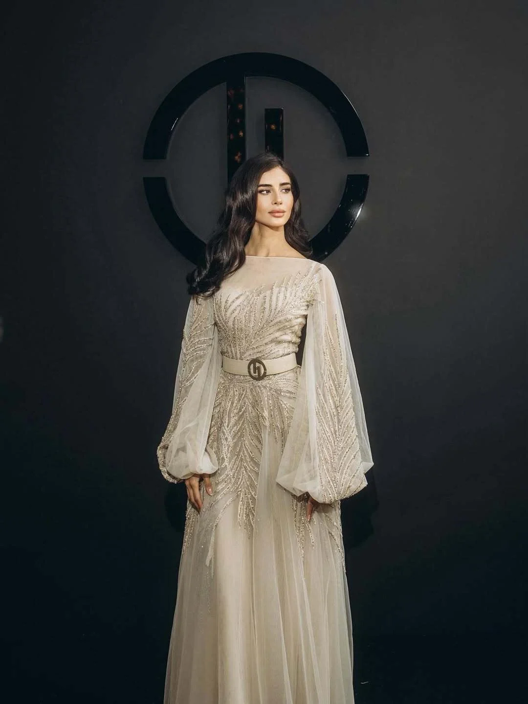 Rahaf in a pale embroidered look during Paris Fashion Week